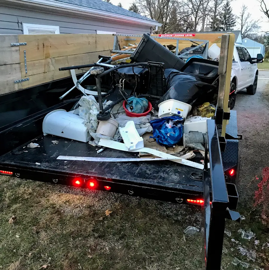 Roll-off dumpster delivered to a residential driveway in Rolesville