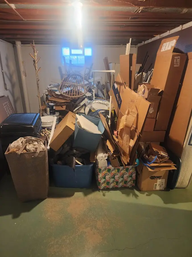 Roll-off dumpster container at job site for Cleanout Dumpster Rental in Rolesville